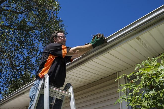 a close-up of a gutter being repaired with new materials in Bonner MT